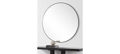 Side look of a mirror with black frame on a white background