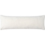 A white kidney-shaped throw pillow with a plush texture, likely made from polyester shearling, with a solid pattern.