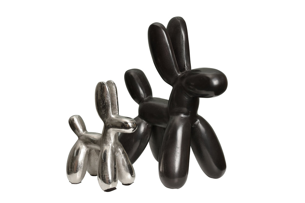 A set of silver and black dog sculpture decor object on a white background