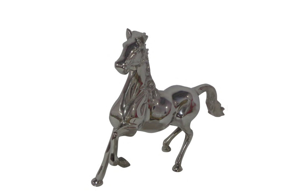 Metallic horse figurine on a white background