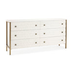 A white wooden sideboard with a geometric pattern on the front, featuring bronze-colored handles and legs.