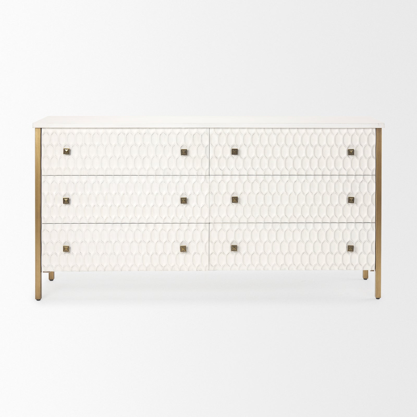 A white wooden sideboard with a geometric pattern on the front, featuring bronze-colored handles and legs.