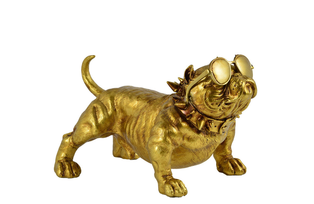 Gold bulldog figurine with spiked collar on a white background