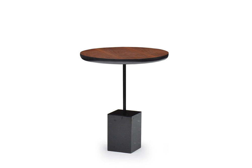 Round wooden table with a black square base on a white background