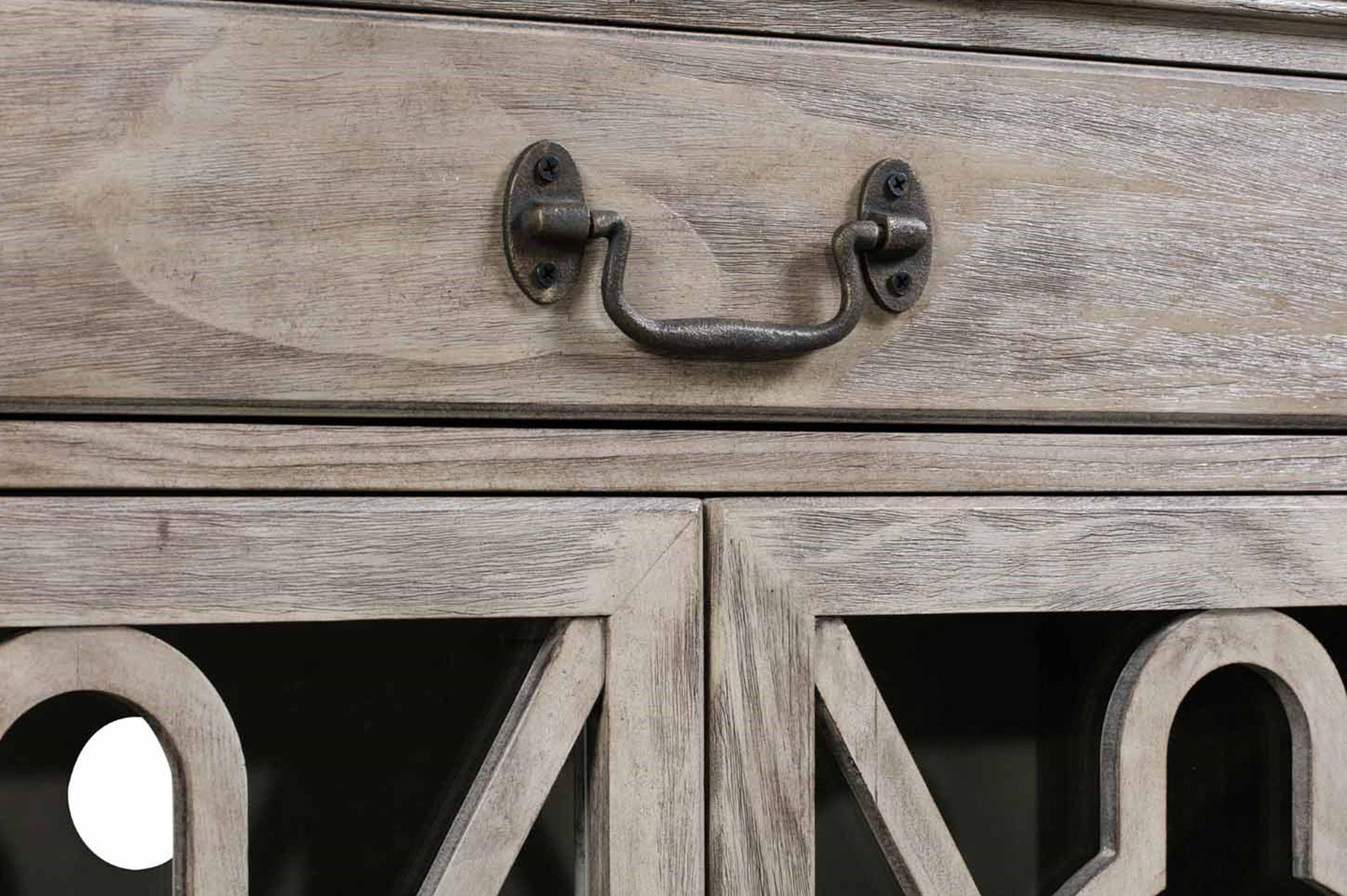 Wooden cabinet with decorative glass doors on a white background