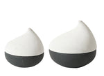 Two white and black decorative jars with a teardrop shape on a white background