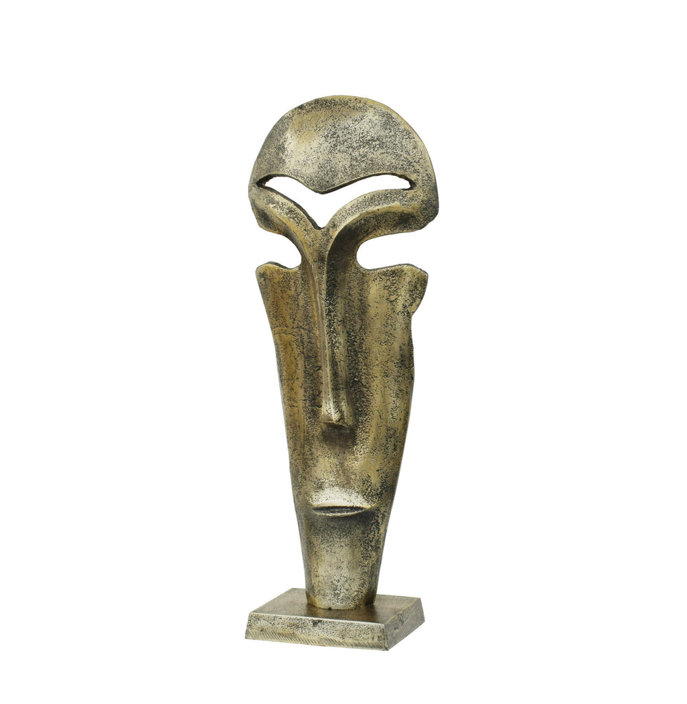 Rustic metal sculpture of a stylized face with a geometric pattern, mounted on a square base.