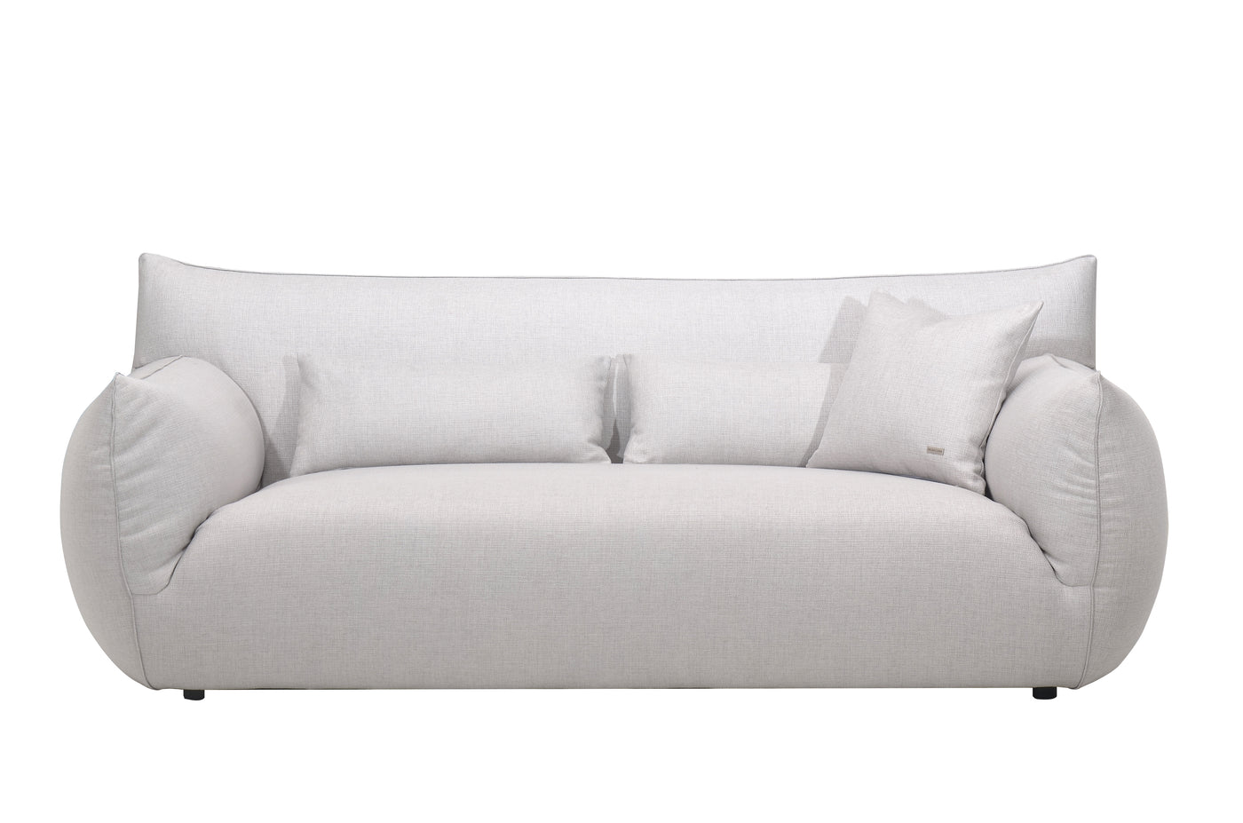 A plush Claudi sofa in a gray fabric, featuring a seamless cushion attached to the back and a sleek, modern design.
