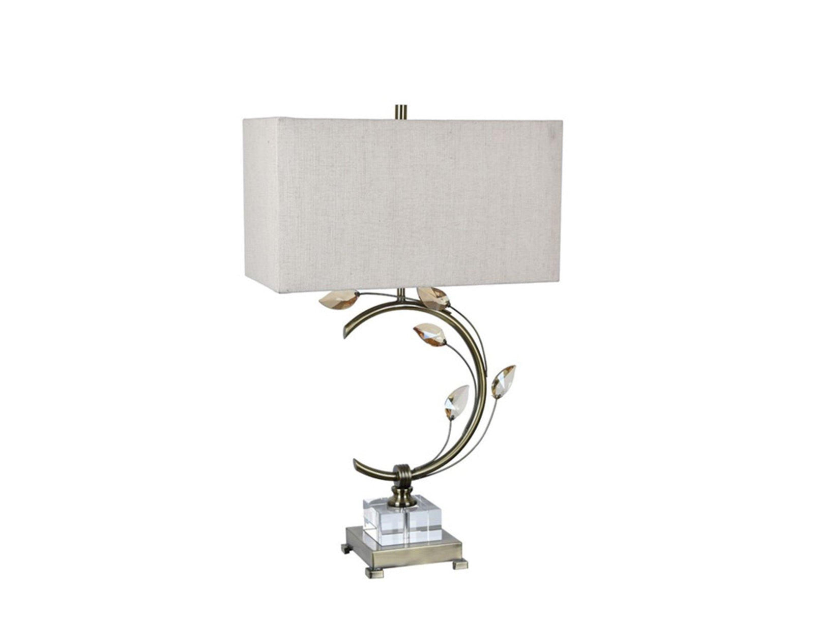 A crystal table lamp with a beige fabric shade and a bronze-colored base and stem, featuring intricate glass detailing.
