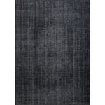 A dark navy area rug with a textured weave pattern, designed for use in a bedroom or hallway.