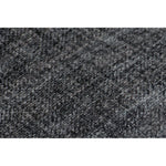 A dark navy area rug with a textured weave pattern, designed for use in a bedroom or hallway.
