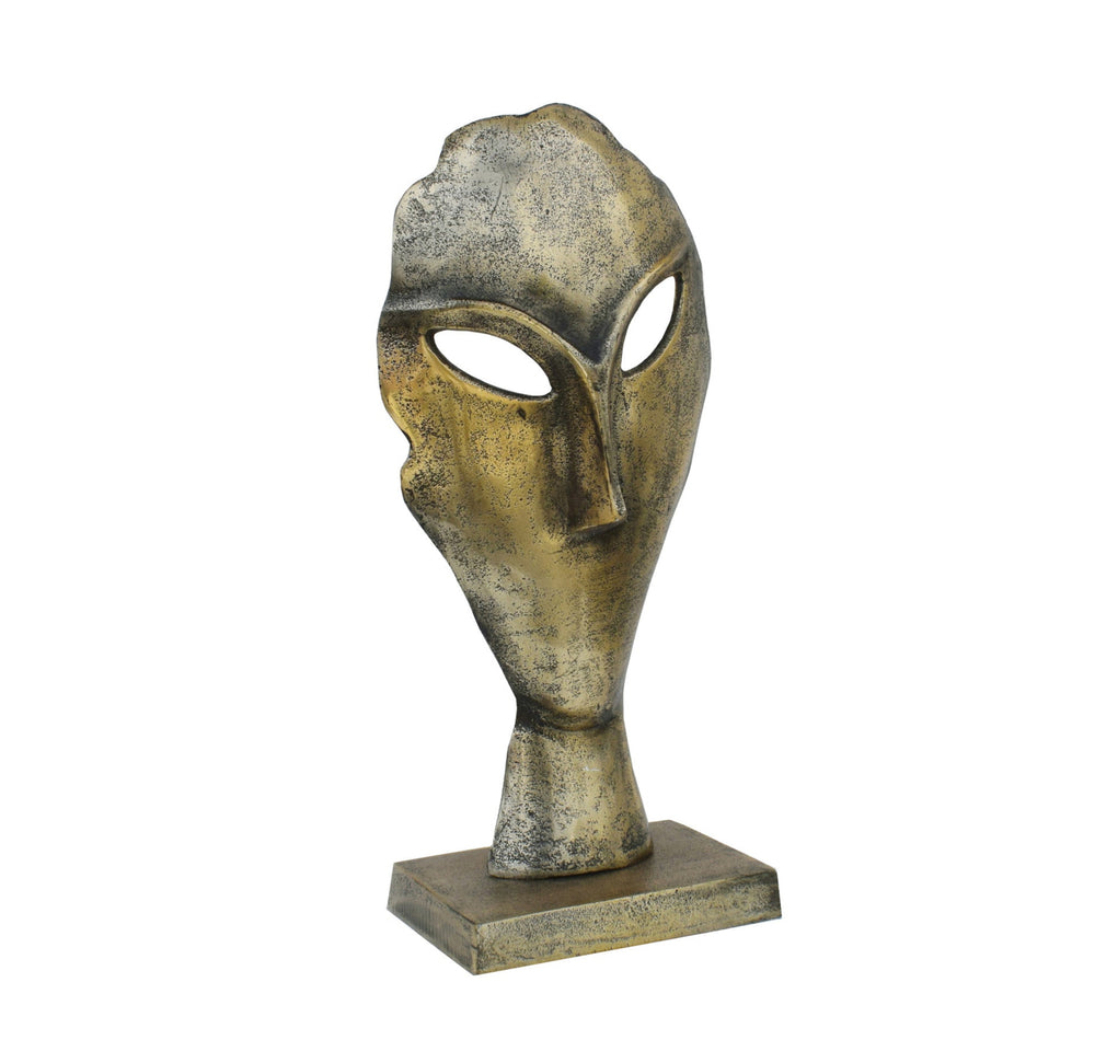 Rustic metal sculpture with a surrealistic touch, displayed on a pedestal.