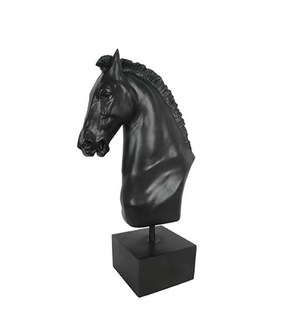 A black horse statue with a naturalistic style, positioned on a simple rectangular base.