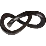 Black metal sculpture of intertwined rings on a white background