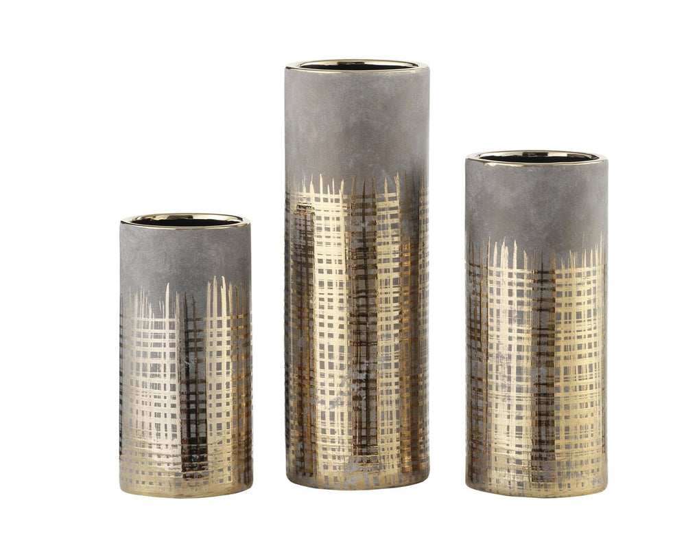 A set of three brass-colored glass vases with a metallic luster finish, displayed in different sizes.