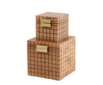 Two brown mango wood modular storage cubes with a natural finish and iron antique brass plated handles.