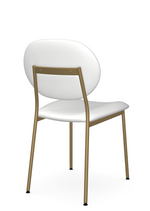 A white dining chair with a full backrest and gold-colored metal legs.