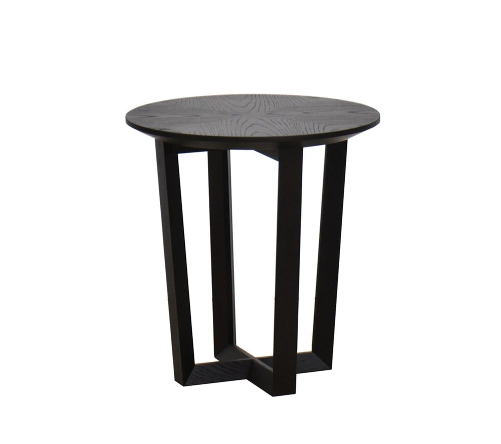 Black side table with a textured top on a white background