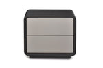 Small nightstand with two drawers, one black and one silver, on a white background