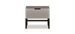 Small side table with a gray top and black base on a white background