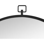 A round silver-framed wall mirror with a gold metallic finish.