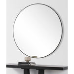 Side look of a mirror with black frame on a white background