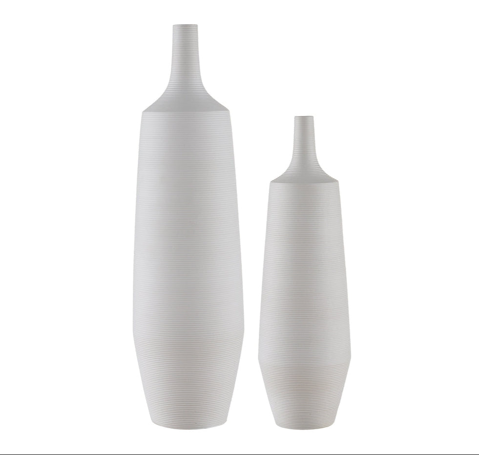 Two white vases of different sizes, with a smooth finish and a classic shape.