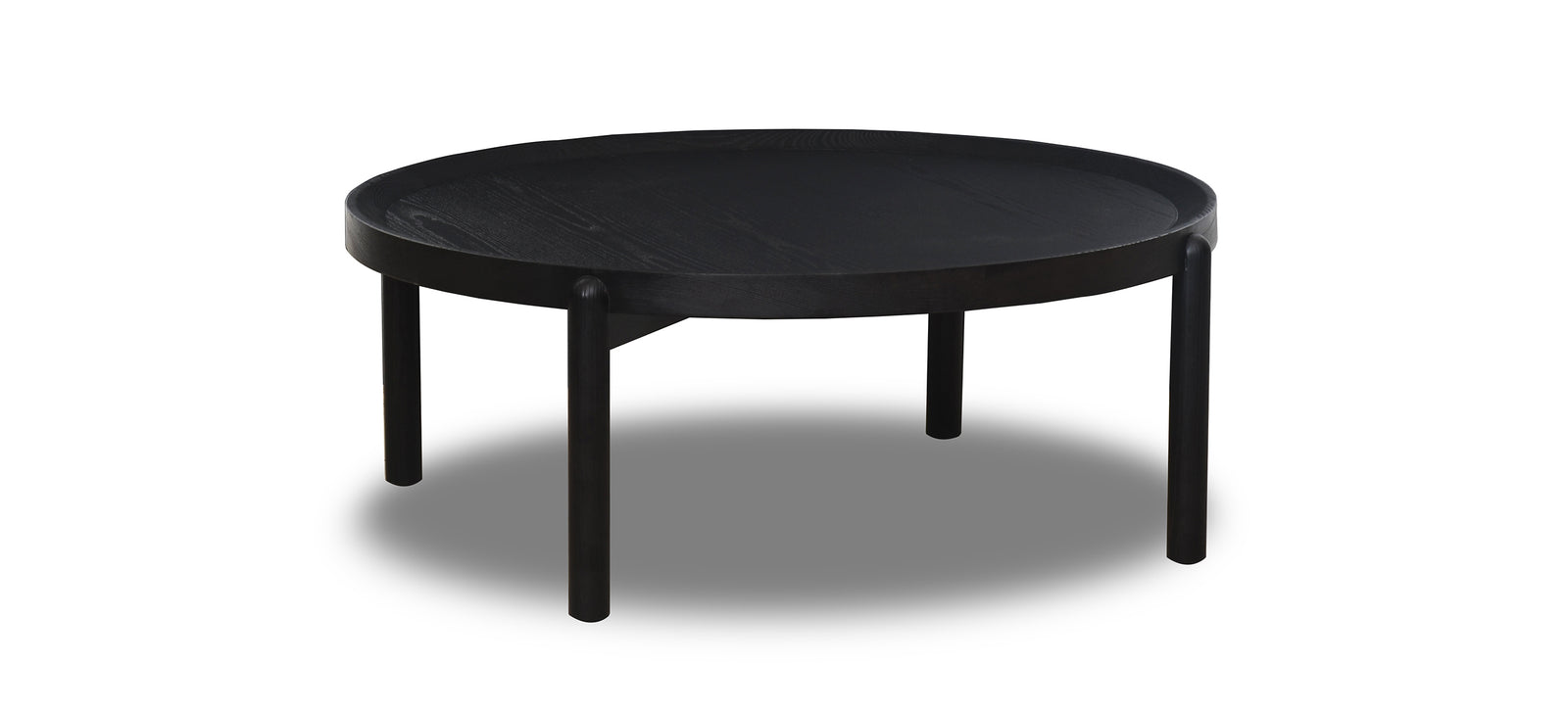 A round, black coffee table with a simple design and no visible legs.