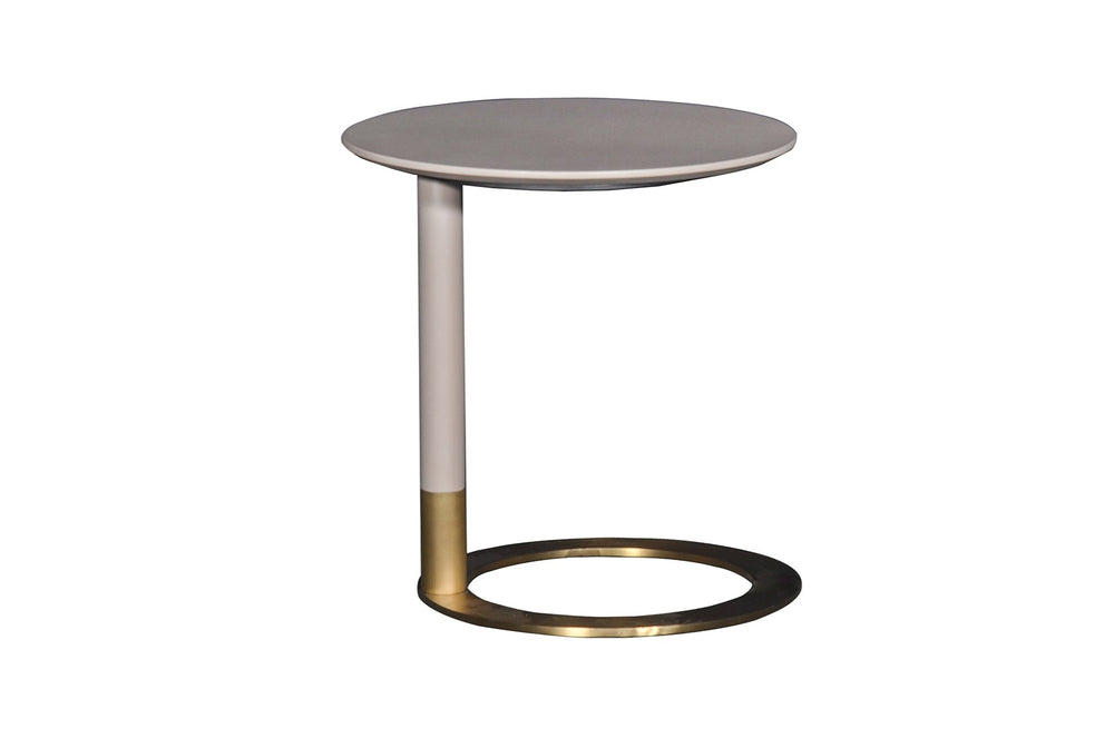 Small round table with a gold base on a white background