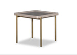 Small square table with a gray top and gold legs on a white background