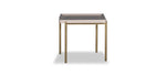 Small square table with a gray top and gold legs on a white background