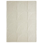 An ivory-colored wool area rug with a geometric patterned design, hand tufted with a cotton backing.