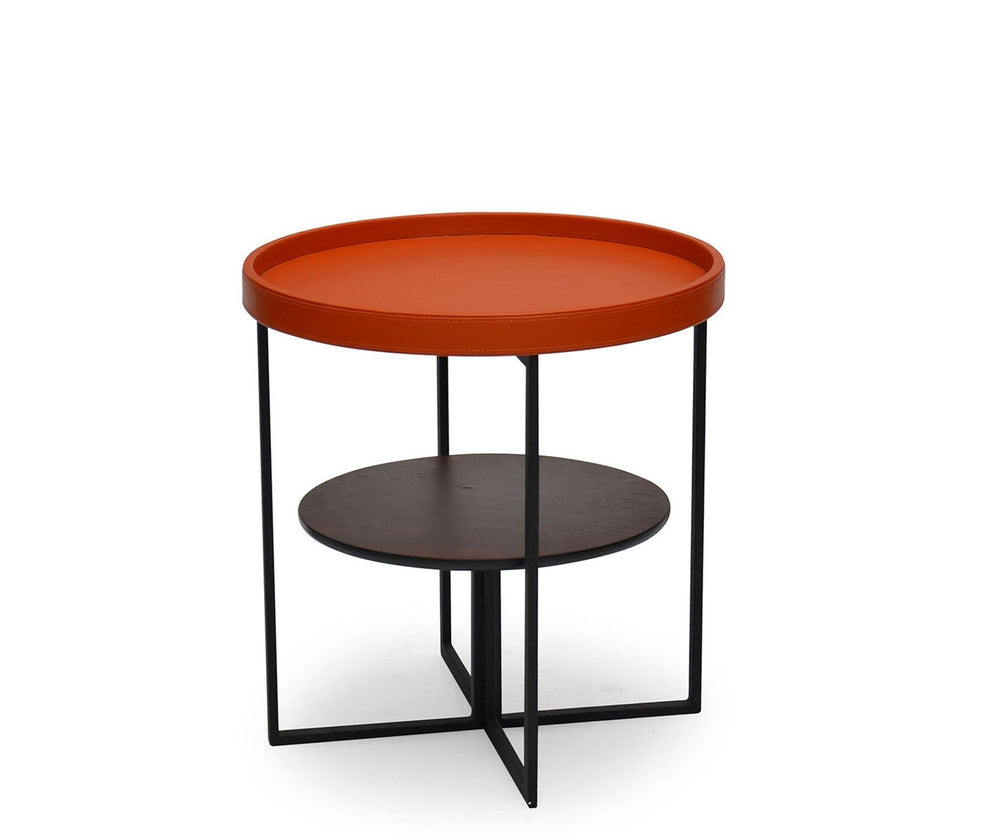 Side table with a red top and black metal frame on a white background