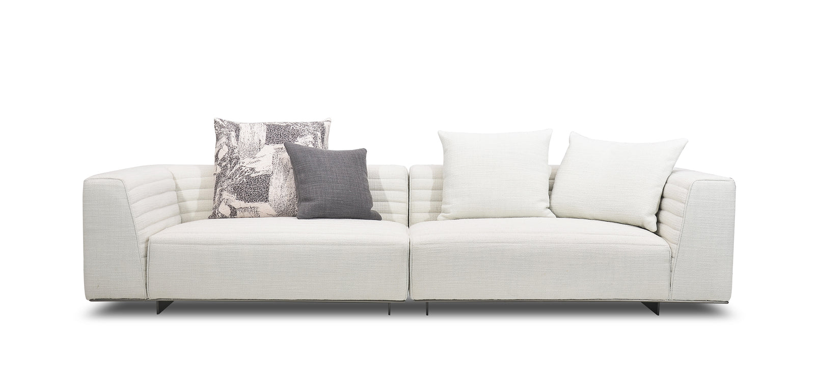 A white sectional sofa with goose down filling, featuring a minimalist design with a chrome metal frame and a photograph on the backrest.
