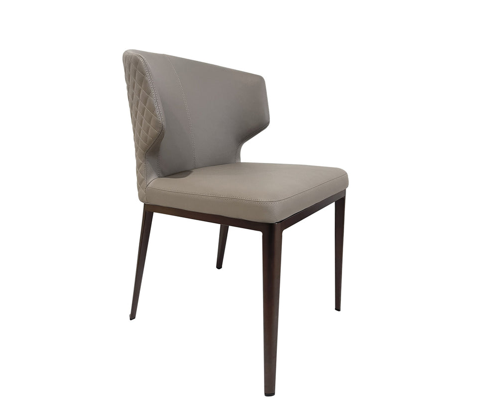 A dark taupe upholstered dining chair with a diamond quilted design, featuring a wooden frame and padded backrest and seat.