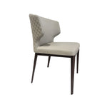A beige upholstered dining chair with diamond quilted backrest, seated on a wooden frame.